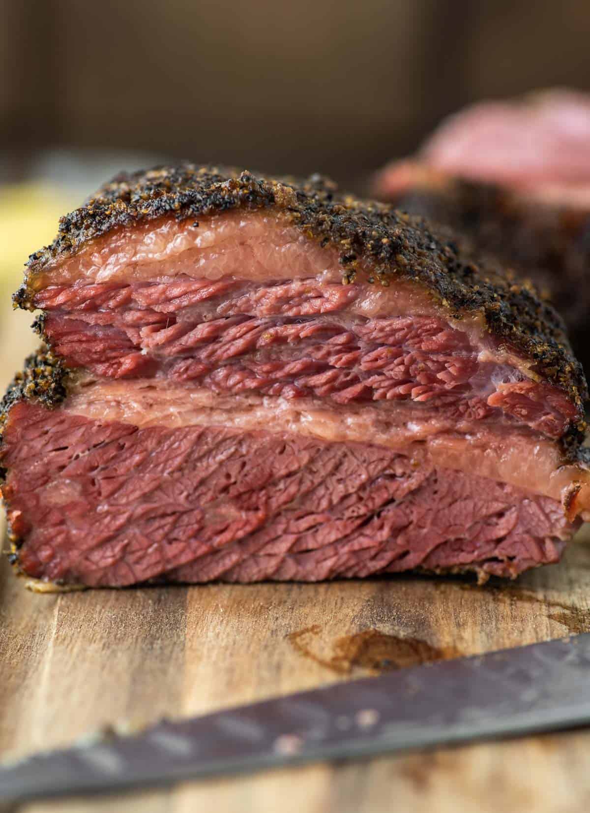 close-up of smoked corned beef on cutting board