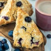 close-up of blueberry scones on wood board