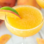 close-up of peach daiquiri in coupe glass
