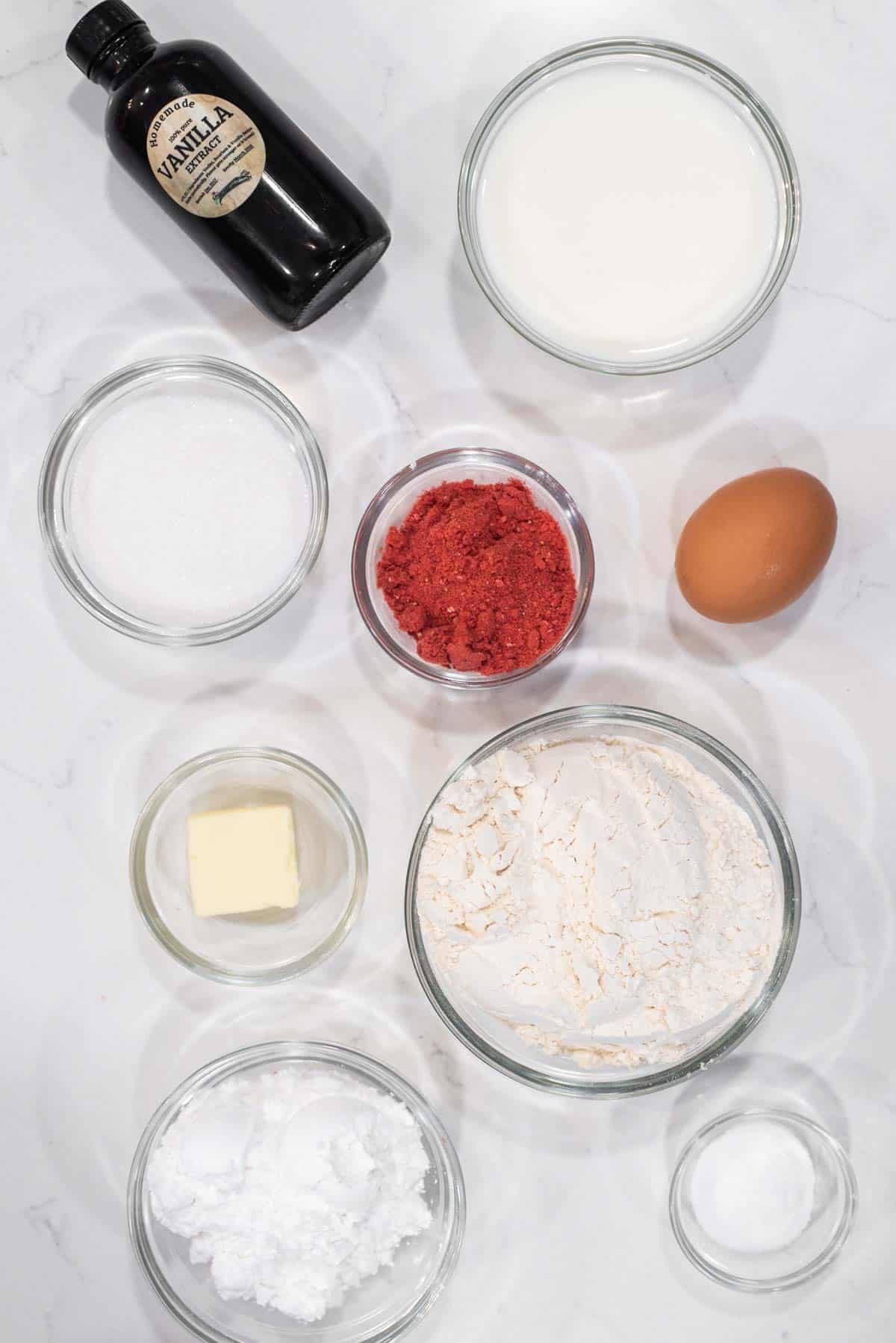 overhead shot of ingredients for strawberry glazed donuts