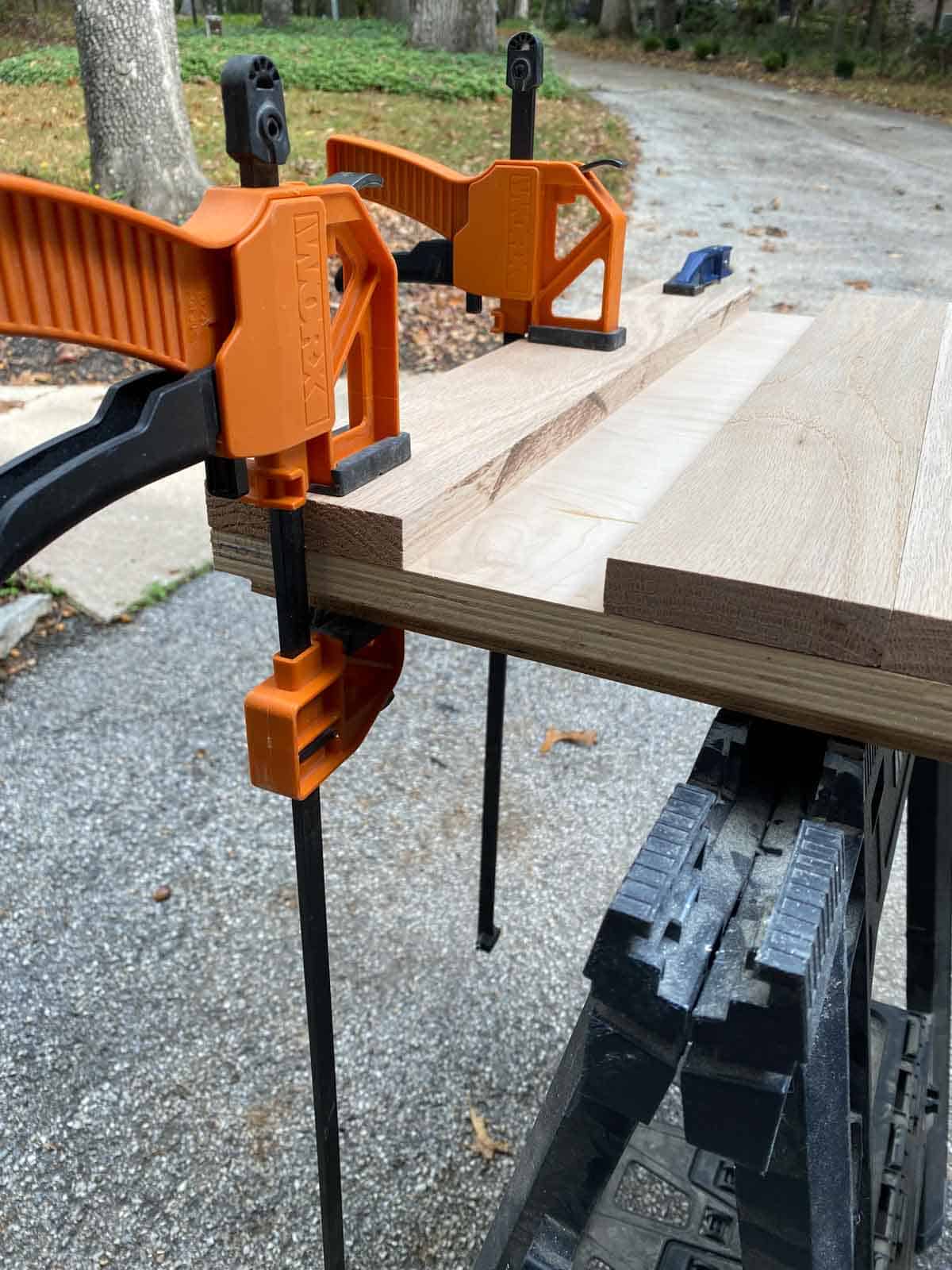 process shots of adding oak wood to top shelf