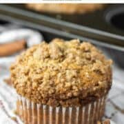 close-up of cinnamon streusel muffin on dish towel