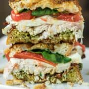 turkey pesto sandwich stacked on top of each other