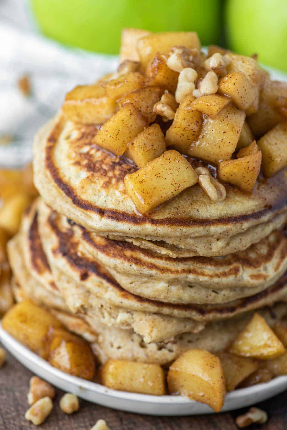 close-up of apple ricotta pancakes stacked on top of each other