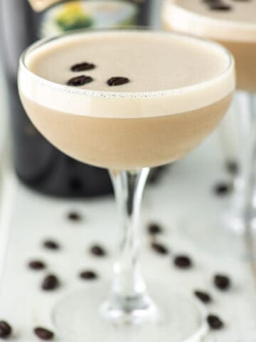 two coupe glasses of Baileys espresso martinis