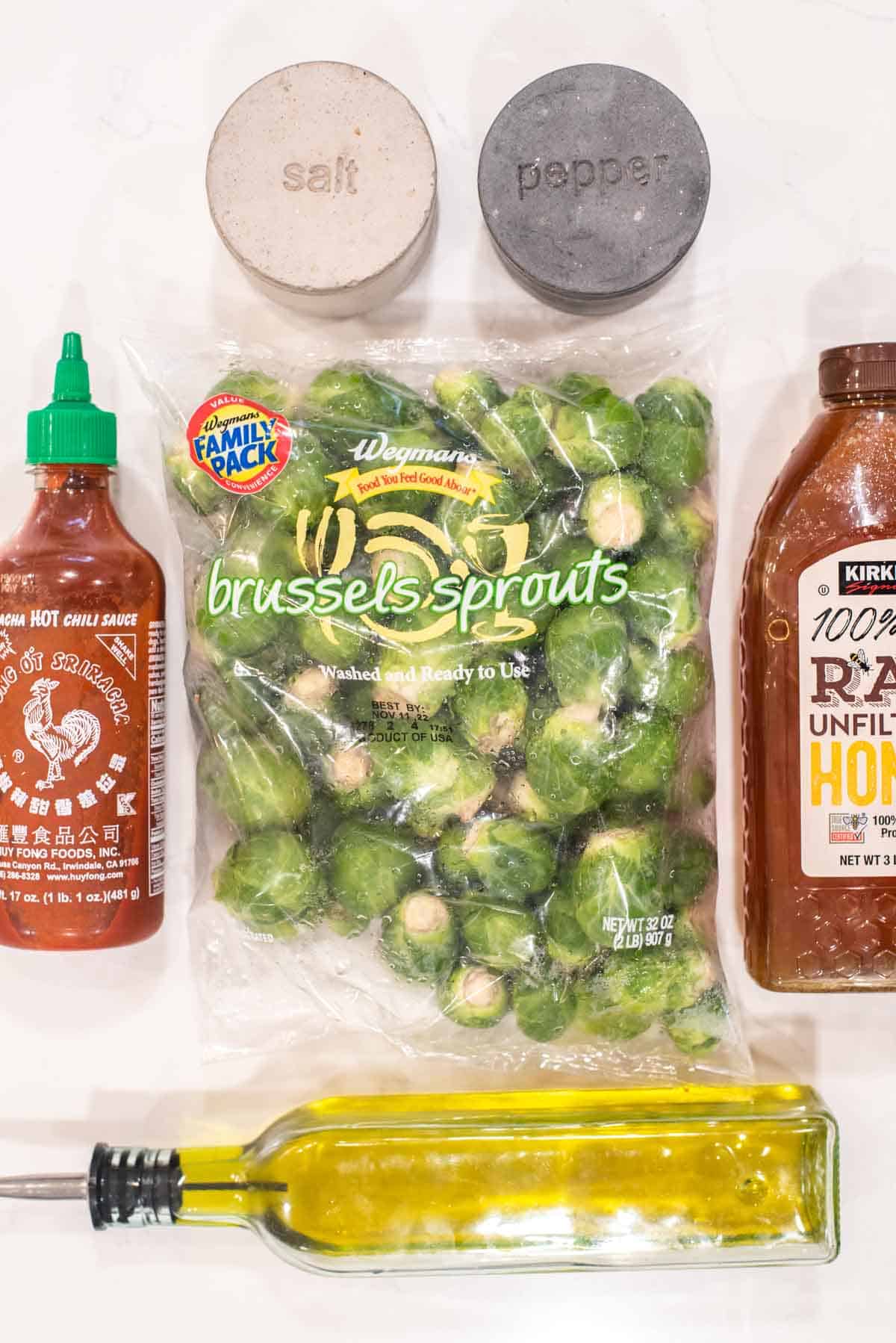 overhead shot of ingredients for honey sriracha brussels sprouts