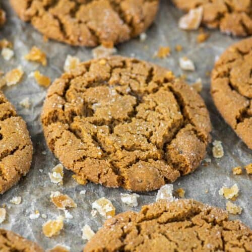 close-up of ginger cookies on parchment-lined baking sheet