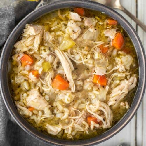 overhead shot of Instant Pot chicken and rice soup in grey bowl