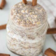 cinnamon overnight oats in glass mason jar