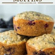 one blackberry oatmeal muffins stopped on top of others
