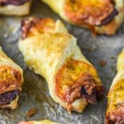 cheese and bacon turnovers on parchment paper