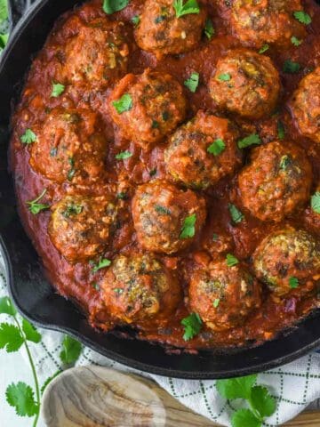 overhead shot of Mexican meatballs in cast iron skillet