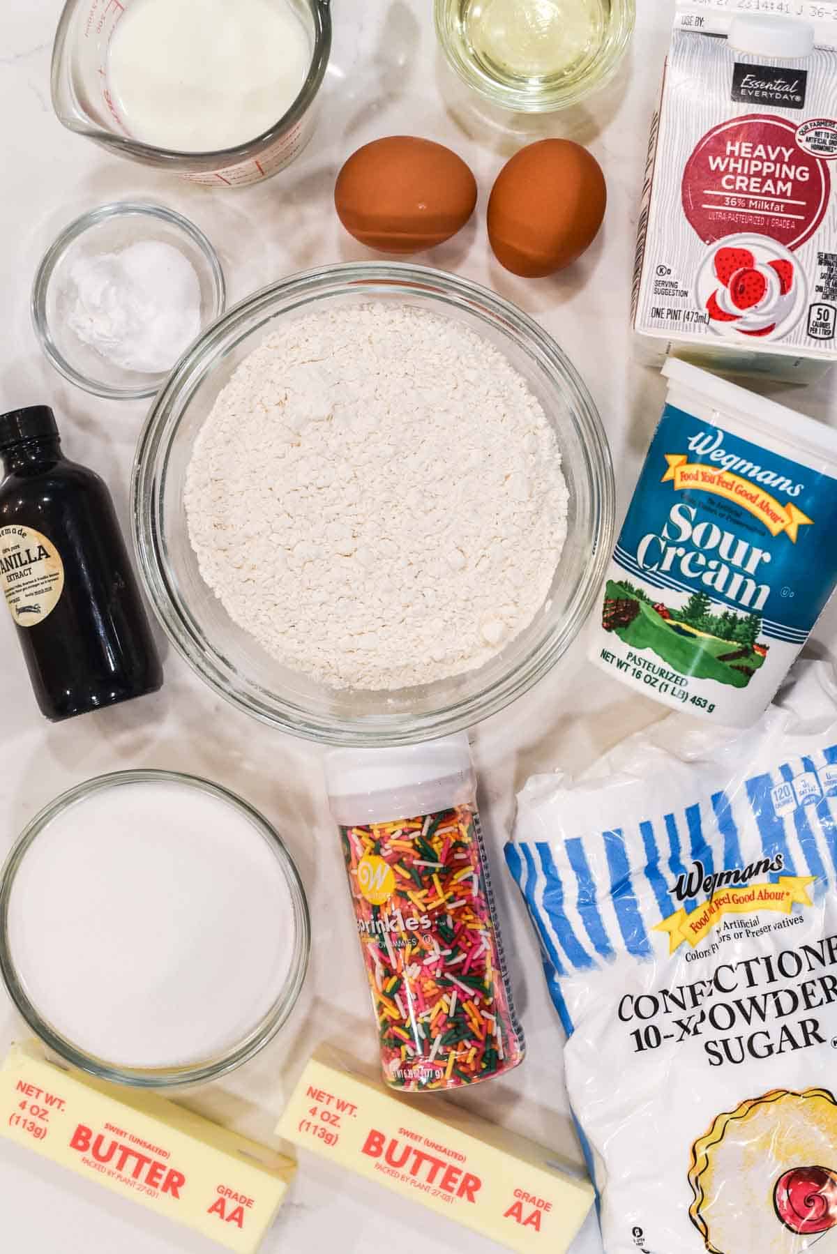 overhead shot of ingredients for funfetti cupcakes
