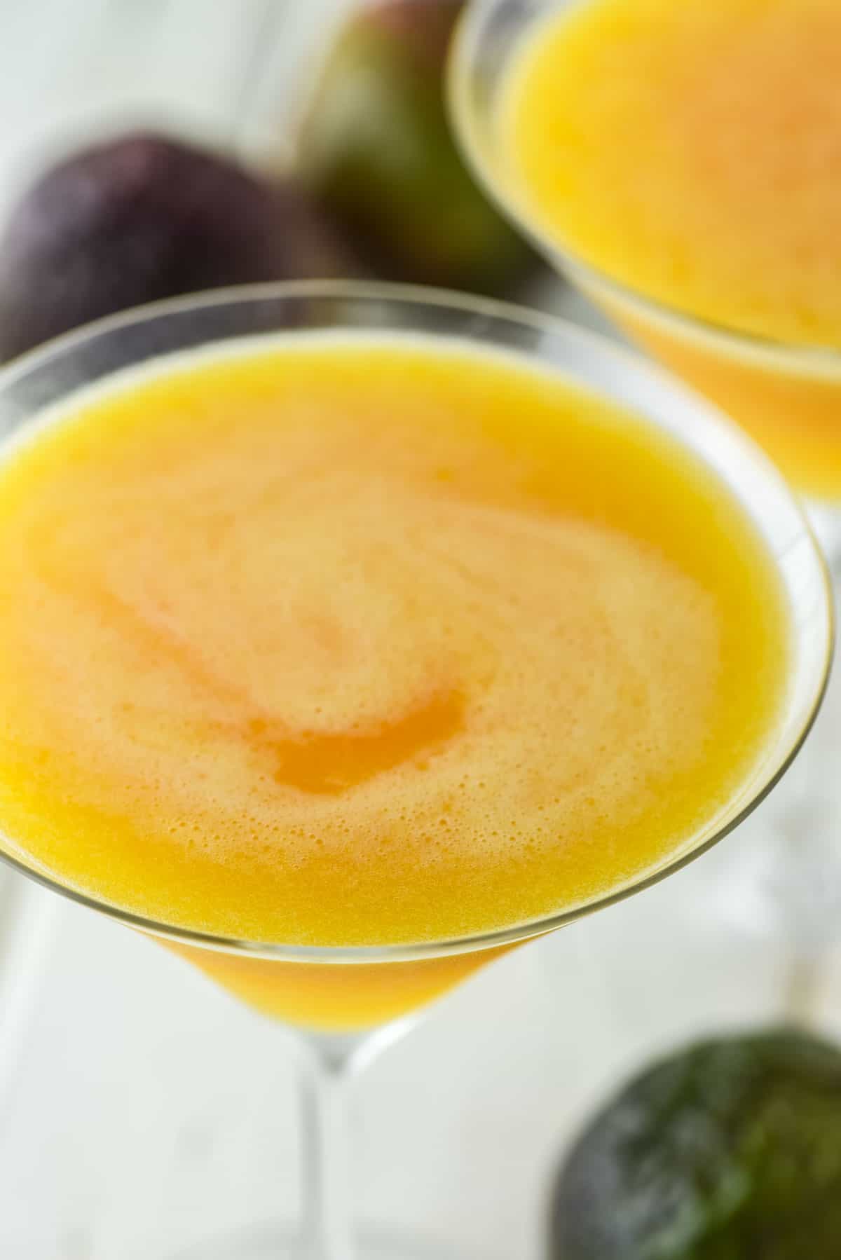 close-up of passion fruit martini in glass