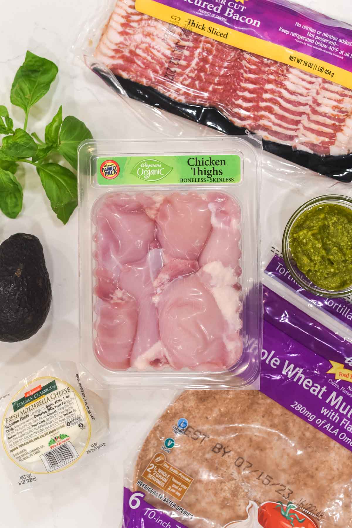 overhead shot of ingredients for chicken pesto wrap
