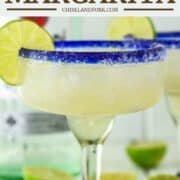 glass of rum margarita with lime on rim