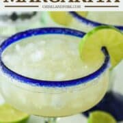 close-up of rum margarita in margarita glass with lime