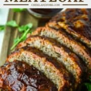 sliced smoked meatloaf on wood cutting board