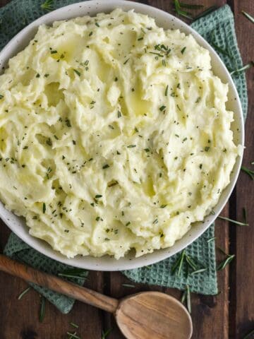 overhead shot of rosemary mashed potatoes in bowl