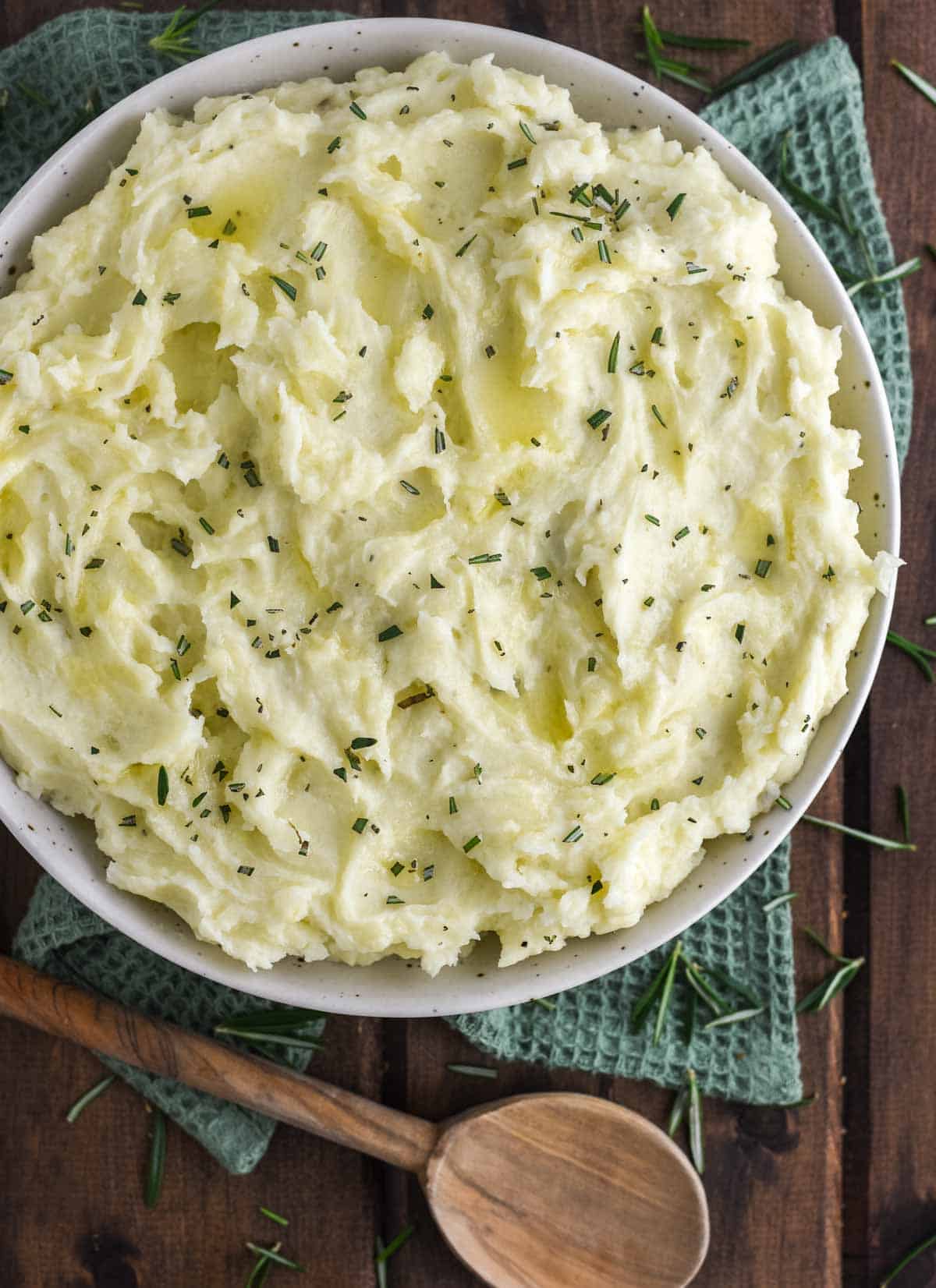 overhead shot of rosemary mashed potatoes in bowl