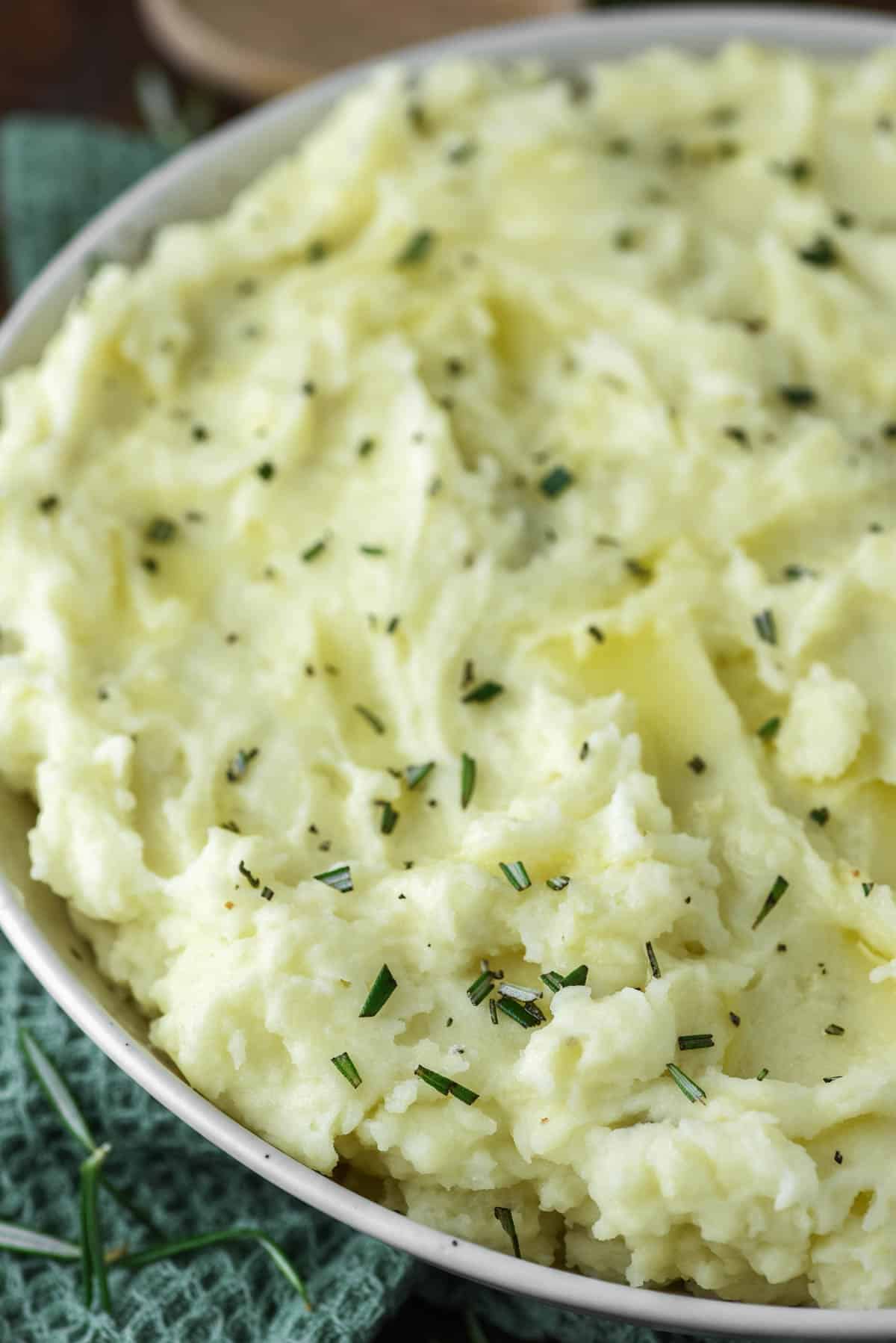 close-up of rosemary mashed potatoes in bowl