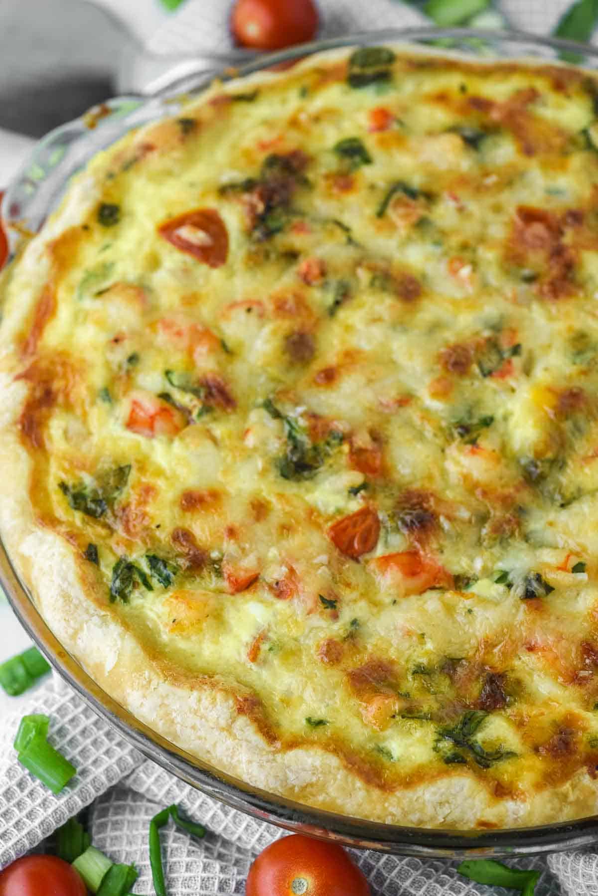 close-up of shrimp quiche in pie plate