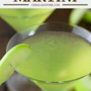 close-up of sour apple martini in v shaped glass