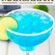 blue margarita with limes on white board